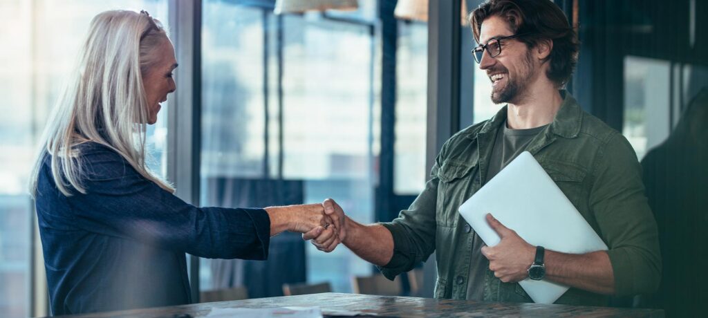 two business people shaking hands