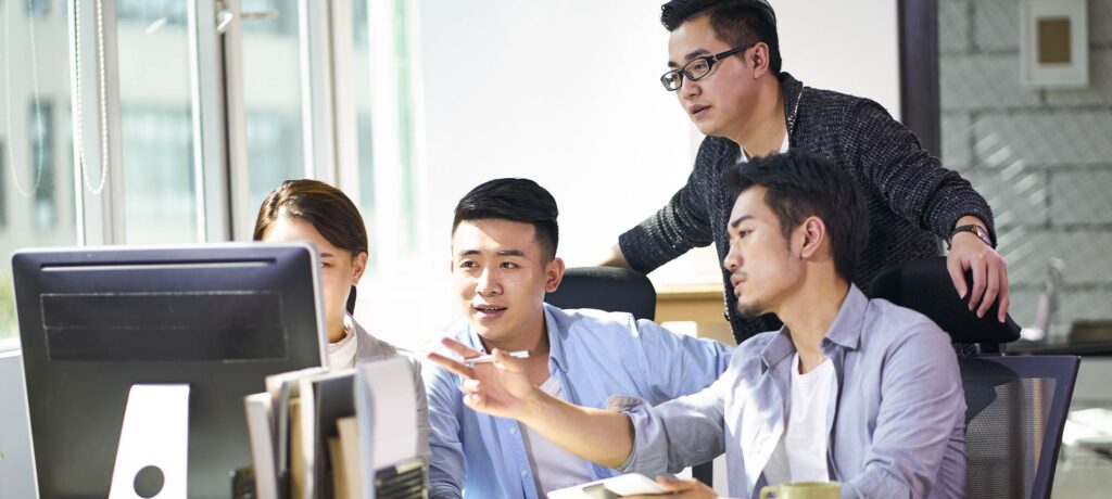 a group of coworkers collaborating