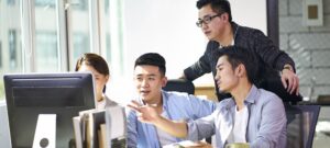 a group of coworkers collaborating