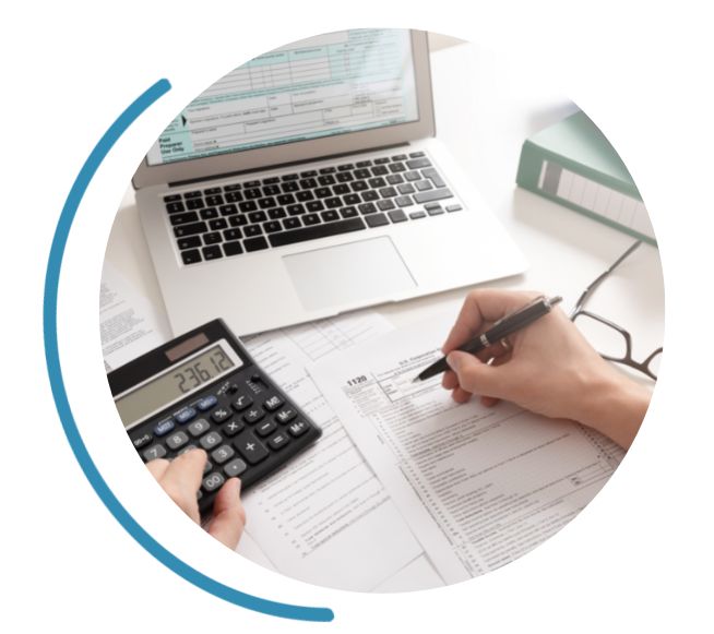 person filling out tax forms