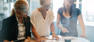 Three women in a meeting