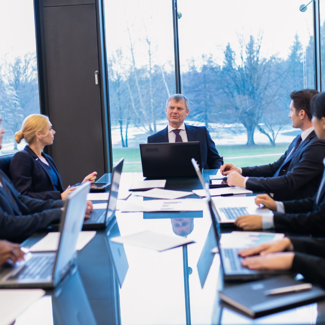 a corporate meeting around a table