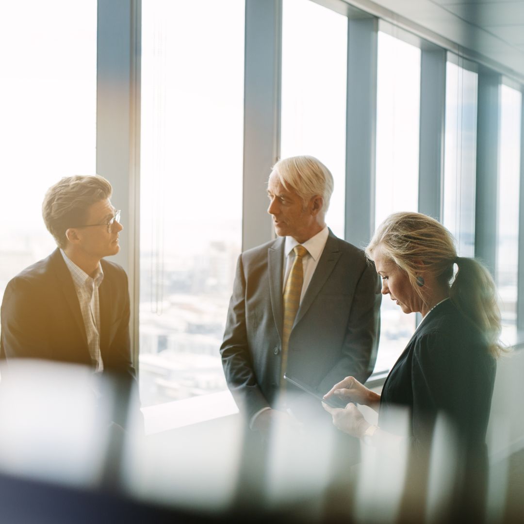 business people meeting in hallway