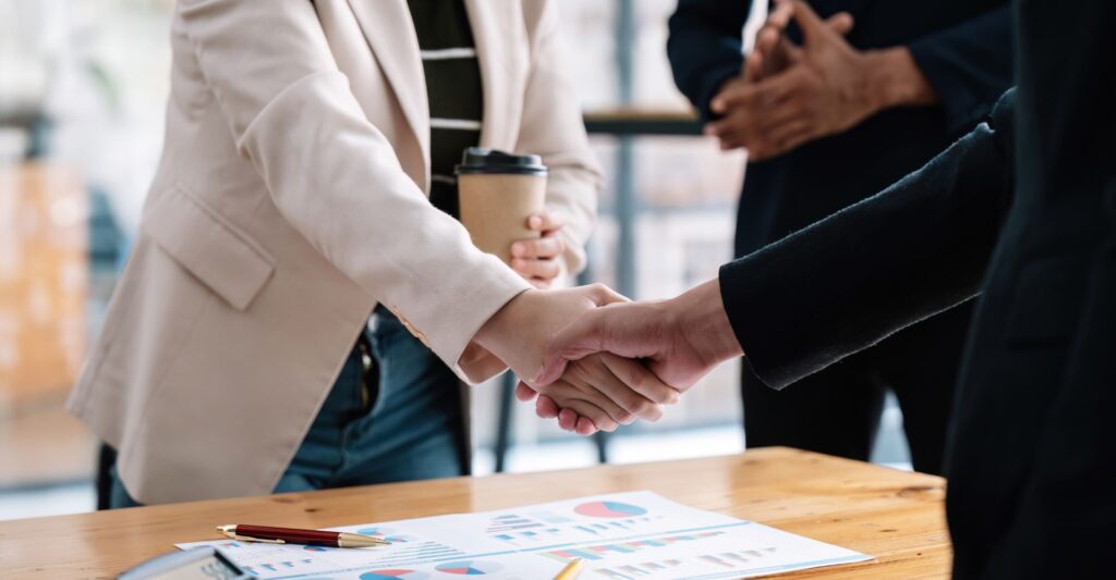 business people shaking hands