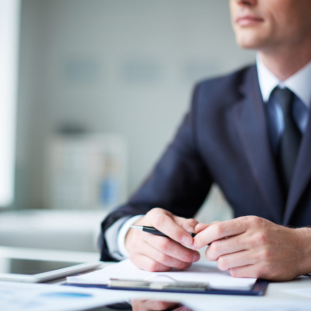 businessman with a pen and notepad