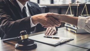 lawyer and client shaking hands